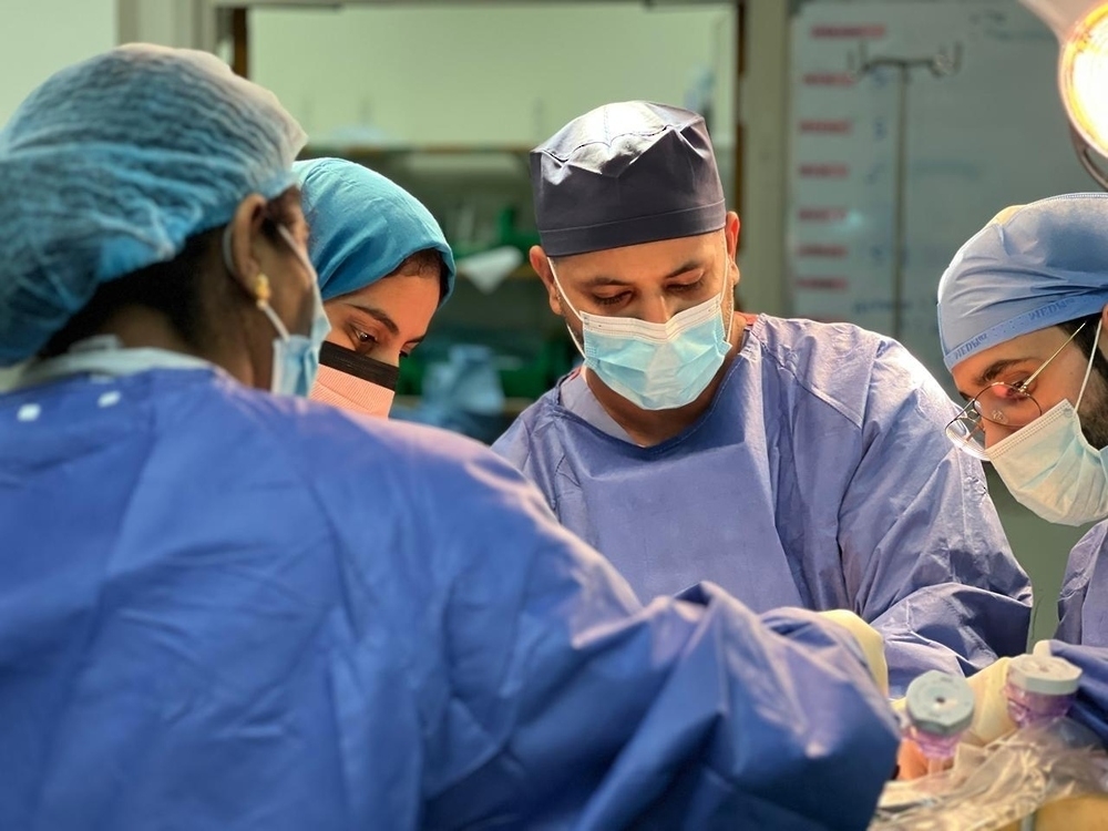 A medical team performing the surgical operation.