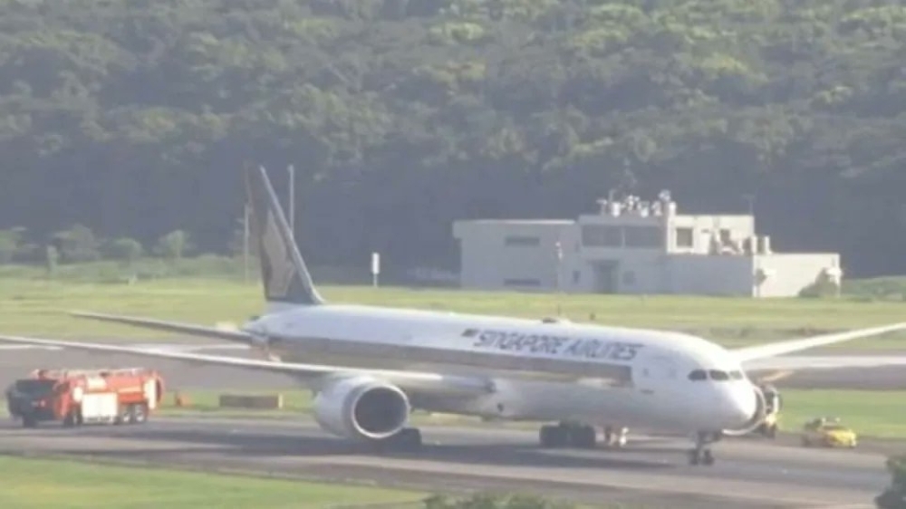 Smoke coming from a landing Singapore Airlines plane forced a runway at Japan's Narita Airport to close