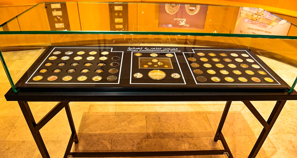 The exhibition features a distinguished collection of coins documenting various stages of Omani monetary history