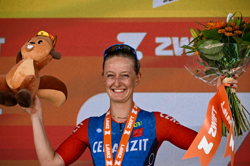  French rider Cedrine Kerbaol celebrates her win on the podium 
