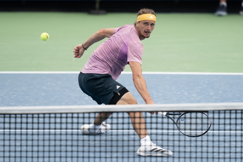 Alexander Zverev of Germany returns a shot against Karen Khachanov on day four of the Cincinnati Open
