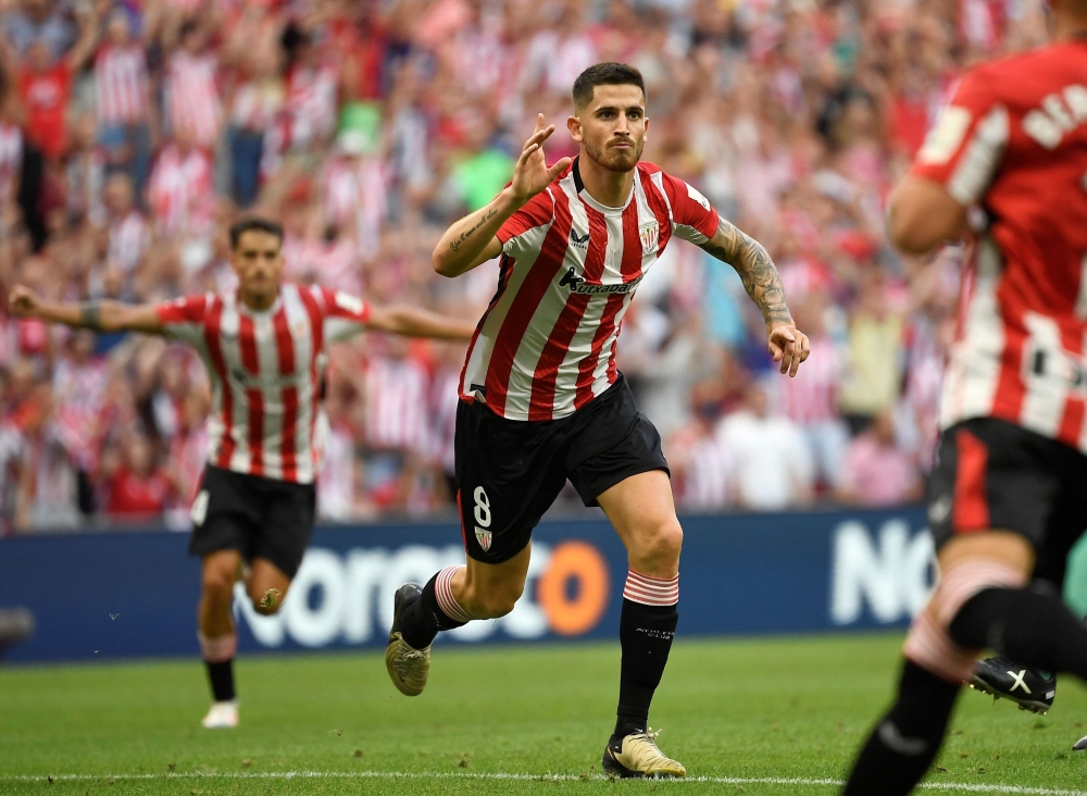 Athletic Bilbao's Spanish midfielder #08 Oihan Sancet celebrates scoring his team's first goal during the Spanish league football match
