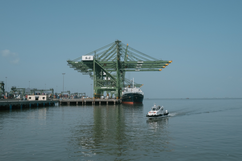 Cranes load and unload the containers of a ship at a terminal at the Jawaharlal Nehru Port, just south of Mumbai, on the west coast of India, May 31, 2024. (Elke Scholiers/The New York Times)