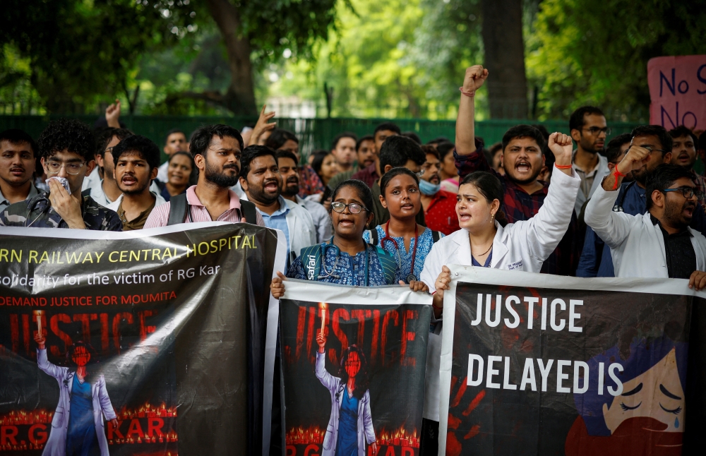 Doctors shout slogans during a protest at a hospital in Kolkata, in New Delhi. — Reuters 