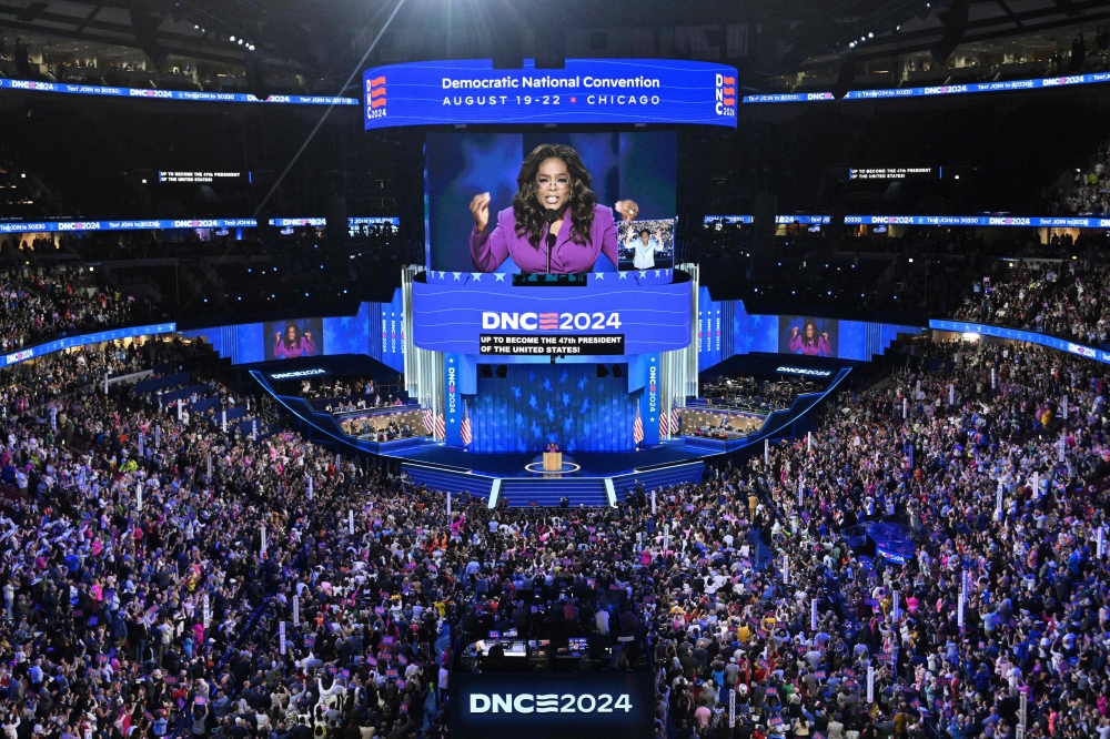 US producer/actress Oprah Winfrey speaks on the third day of the Democratic National Convention (DNC) at the United Center in Chicago, Illinois. - AFP