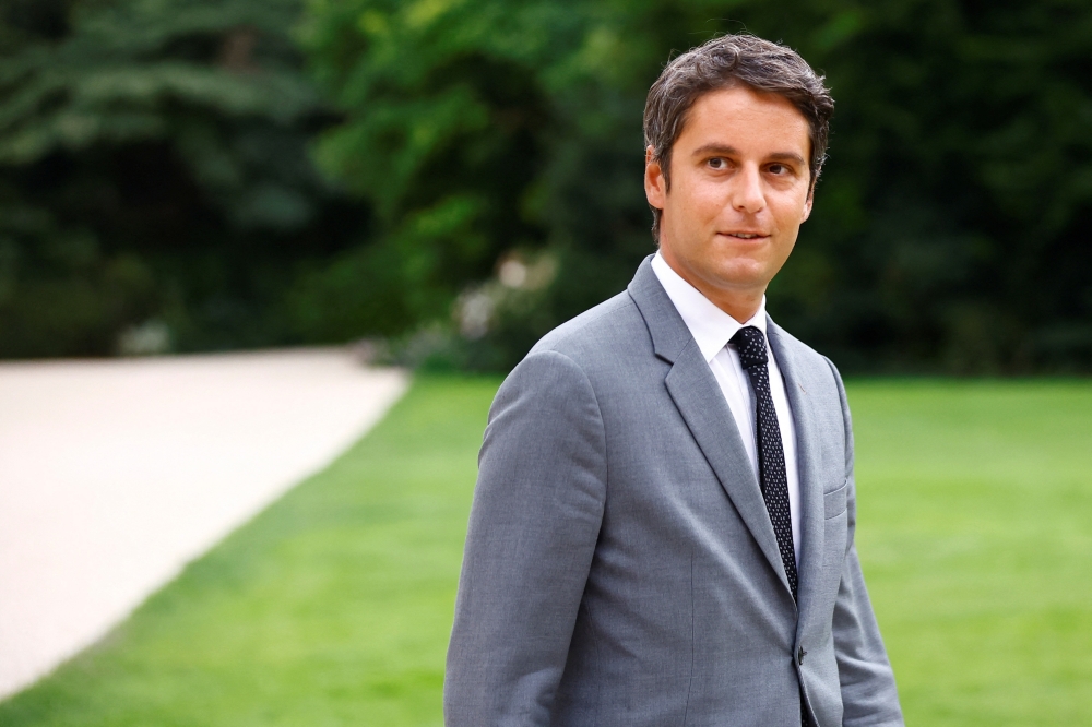 French Prime Minister Gabriel Attal walks outside the Elysee Palace