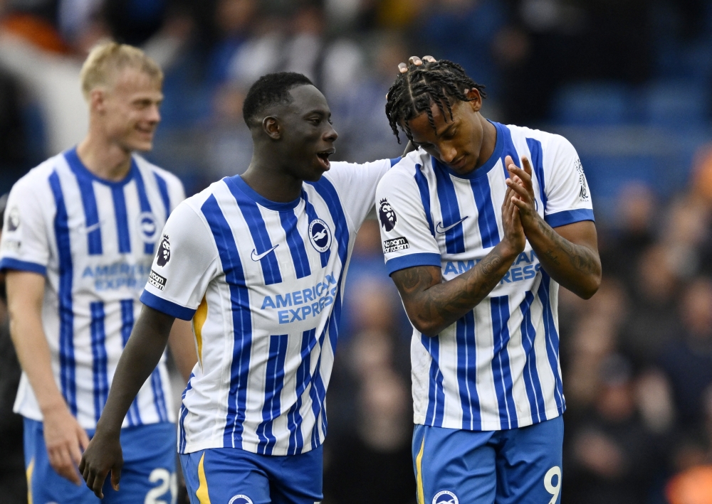  Yankuba Minteh and Joao Pedro celebrate after the match REUTERS
