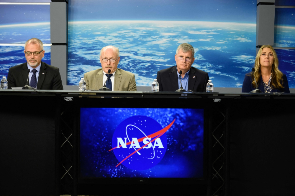 NASA administrators during a news conference 