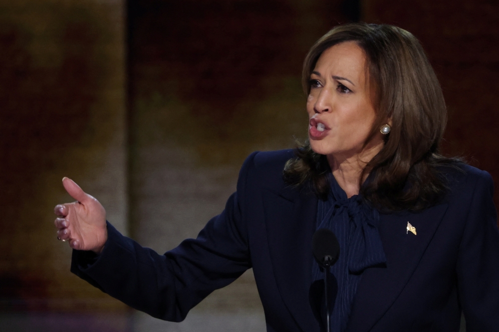 Democratic presidential nominee and US Vice President Kamala Harris takes the stage of the Democratic National Convention (DNC) at the United Centre in Chicago, Illinois. - Reuters