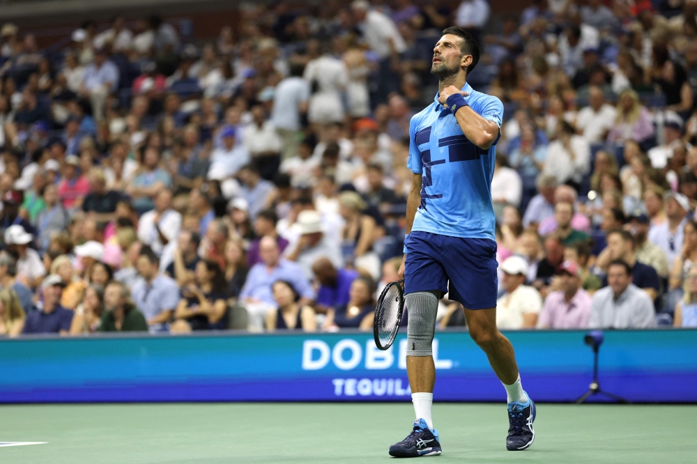 Serbia's Novak Djokovic looks on during his men's singles second round tennis match against Serbia's Laslo Djere. — AFP

