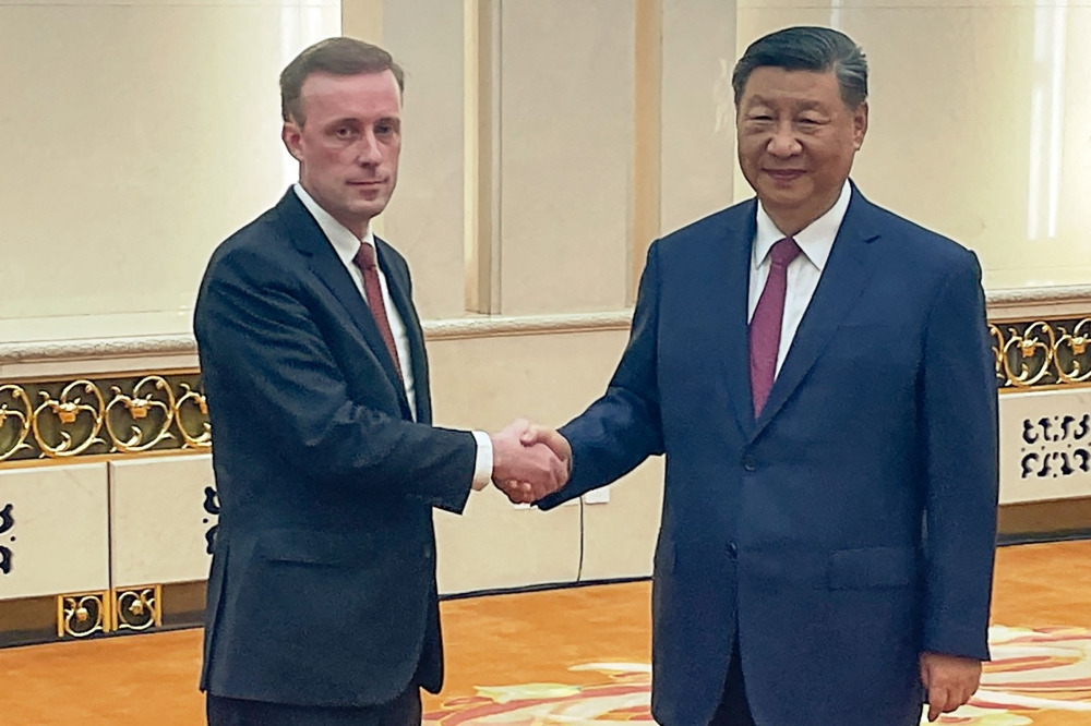 US National Security Advisor Jake Sullivan with China's President Xi Jinping during their meeting at the Great Hall of the People in Beijing. - AFP
