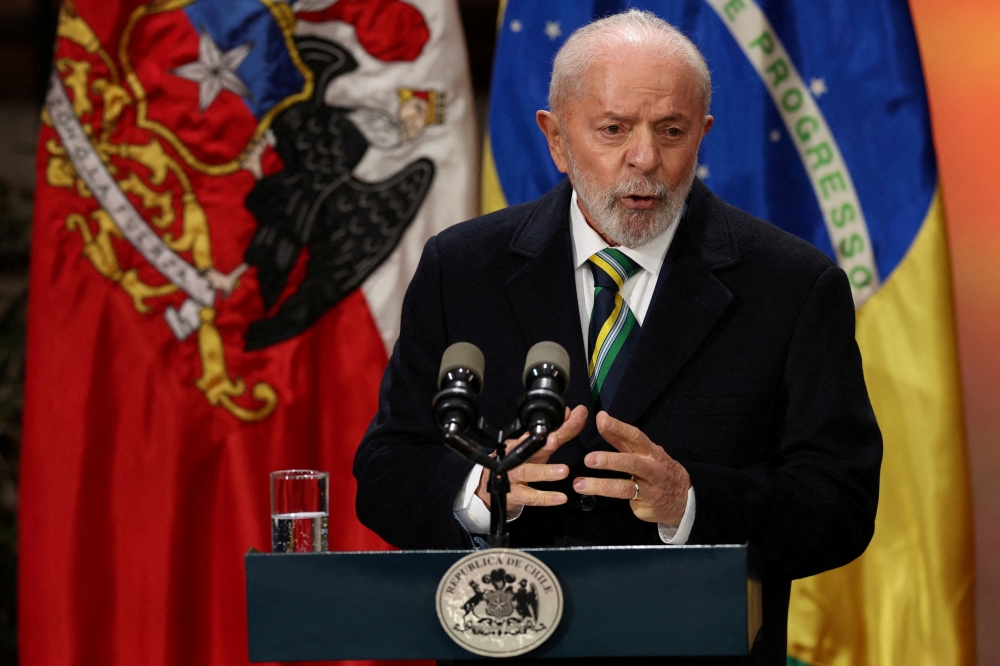 Brazil’s President Luiz Inacio Lula da Silva delivers a statement at La Moneda government palace, in Santiago, Chile 