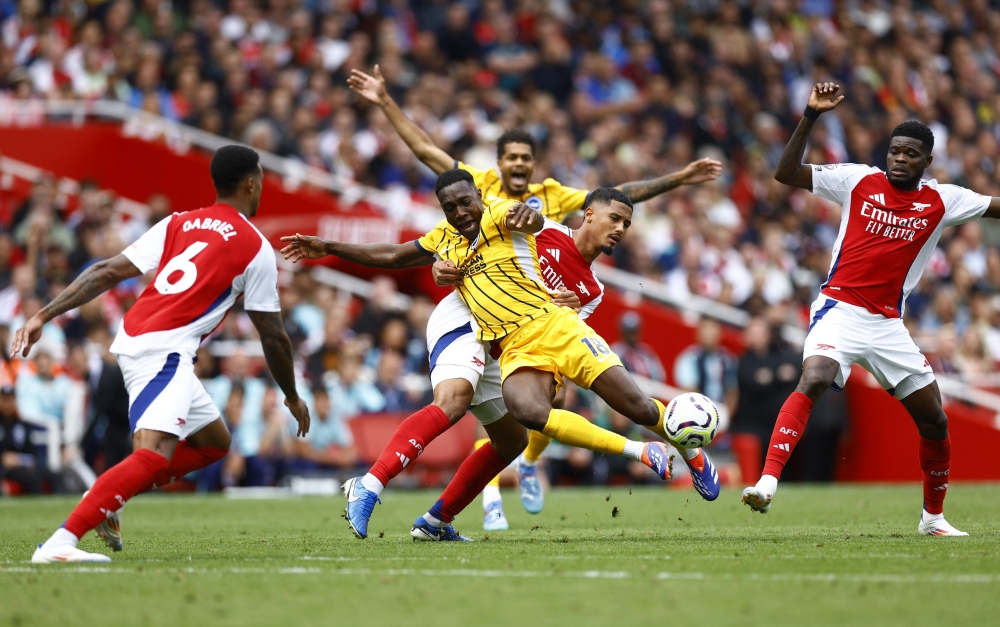  Brighton & Hove Albion's Danny Welbeck in action with Arsenal's William Saliba. — Reuters