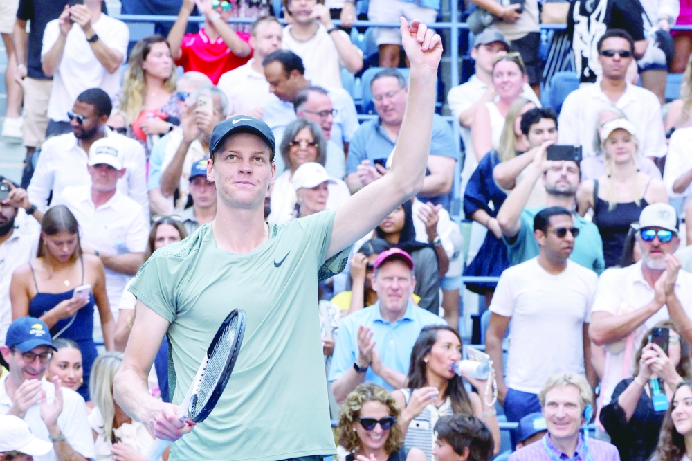 Italy's Jannik Sinner celebrates his victory over Australia's Christopher O'Connell. — AFP