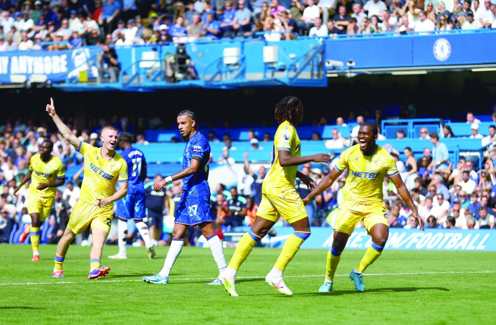 Crystal Palace's Eberechi Eze celebrates scoring their first goal with Cheick Doucoure Action.