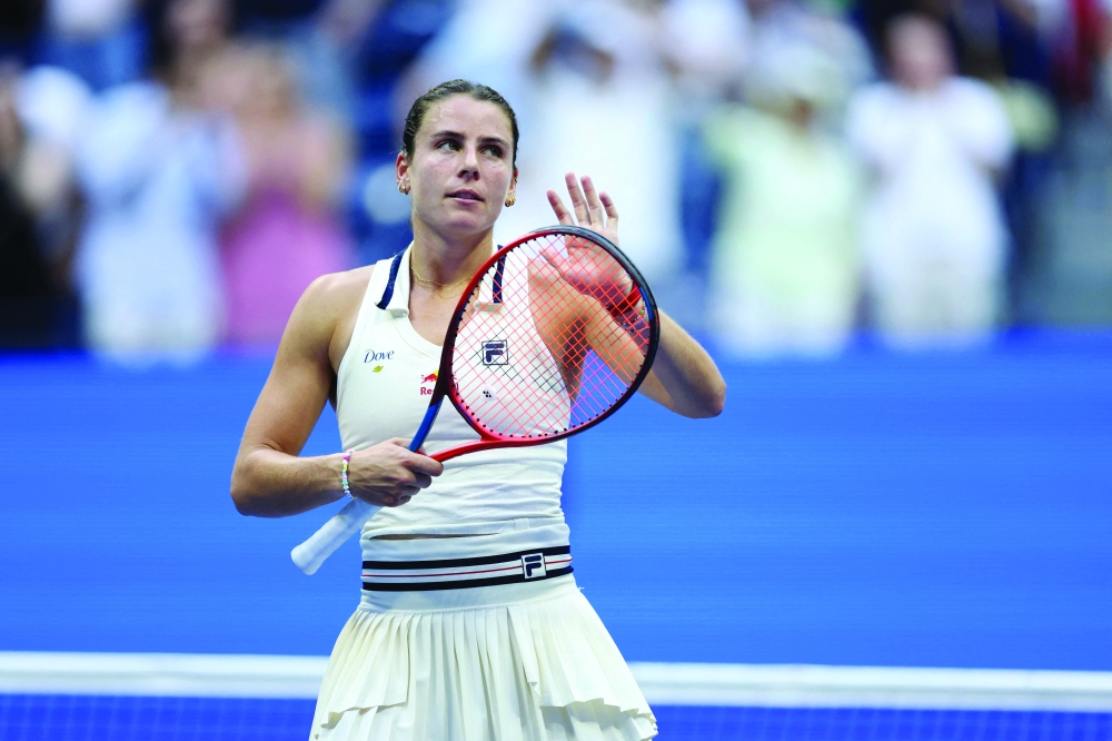 USA's Emma Navarro celebrates winning her women's singles round of 16 tennis match against USA's Coco Gauff on day seven of the US Open tennis tournament at the USTA Billie Jean King National Tennis Center in New York City, on September 1, 2024. (Photo by CHARLY TRIBALLEAU / AFP)

