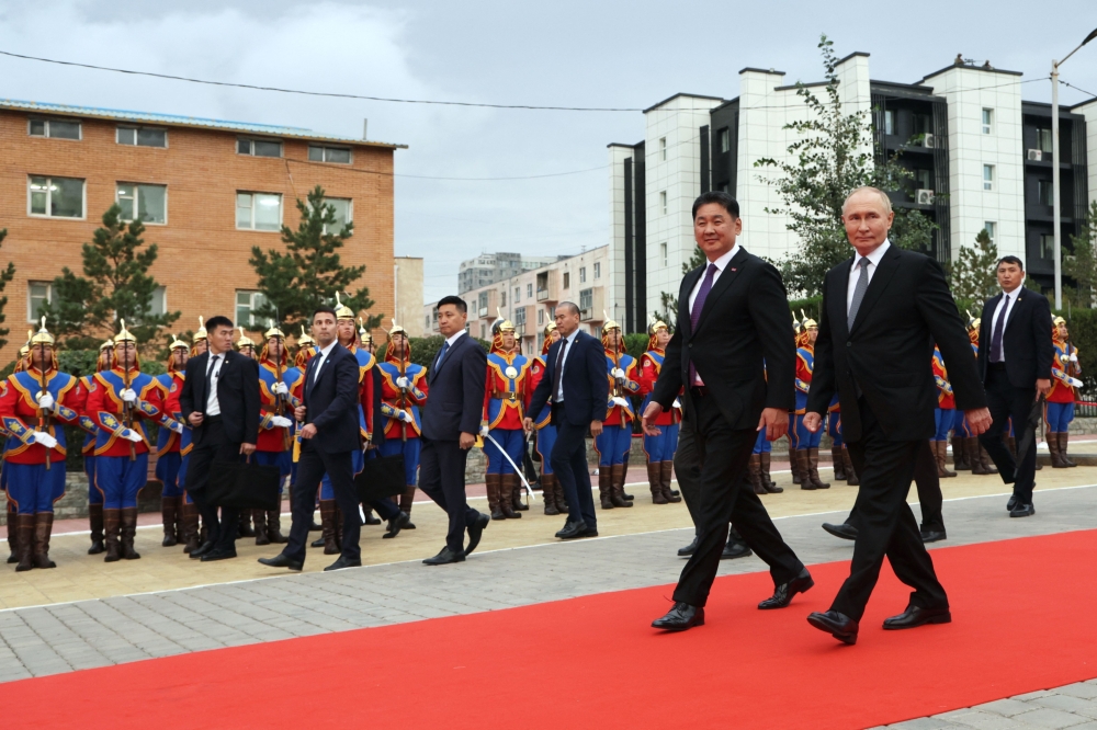 Russia's President Vladimir Putin and Mongolia's President Ukhnaagiin Khurelsukh attend a wreath laying ceremony at a monument to Soviet Marshal Georgy Zhukov in Ulaanbaatar. — AFP 