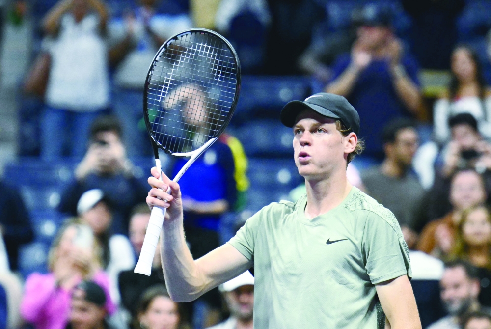 Italy's Jannik Sinner celebrates his win over USA's Tommy Paul during their men's singles round of 16 match on day eight of the US Open tennis tournament at the USTA Billie Jean King National Tennis Center in New York City, on September 2, 2024.