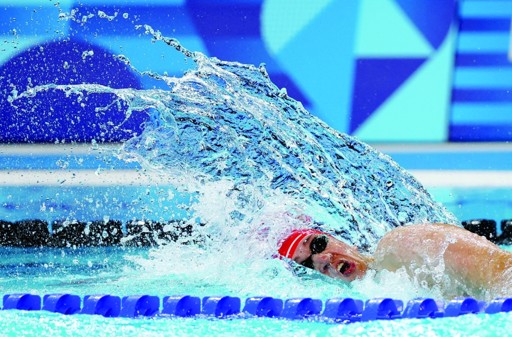 Paris 2024 Paralympics - Swimming - Men's 100m Freestyle - S12 Heats - Paris La Defense Arena, Nanterre, France - September 4, 2024 Dmitriy Horlin of Uzbekistan in action.