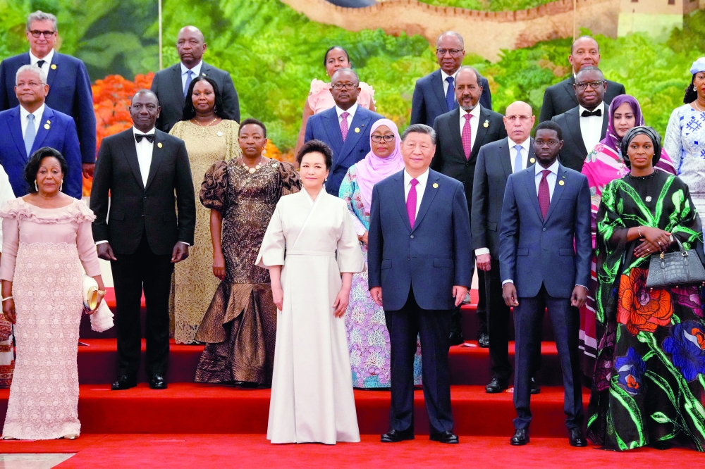 China's President Xi Jinping and his wife Peng Liyuan along with leaders from African nations at the Summit of the Forum on China-Africa Cooperation held at the Great Hall of the People in Beijing.
