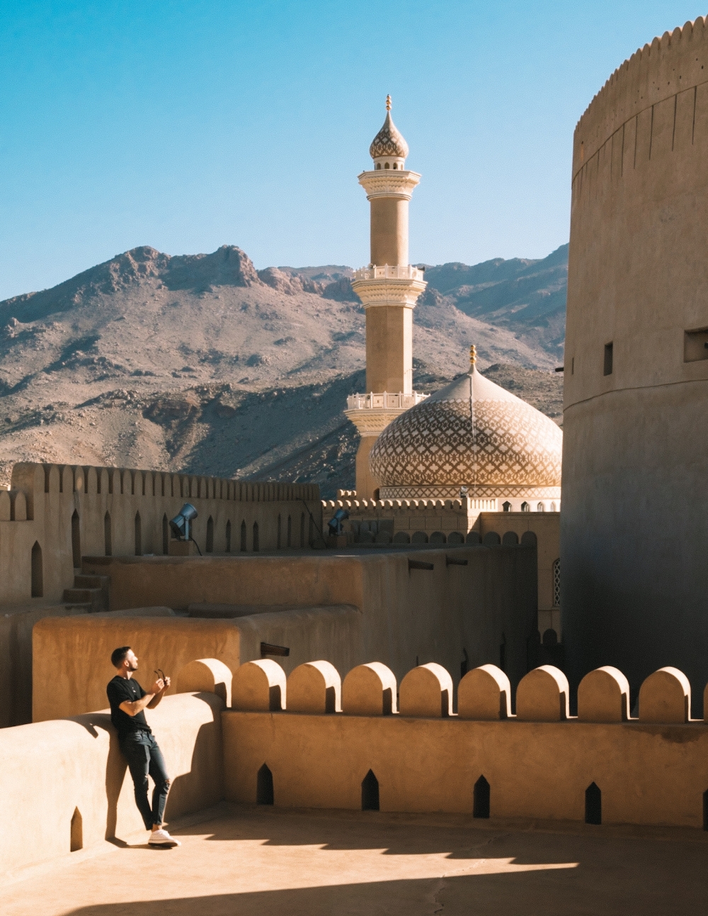 Roman Zanetti gazes at Nizwa Fort, the large castle