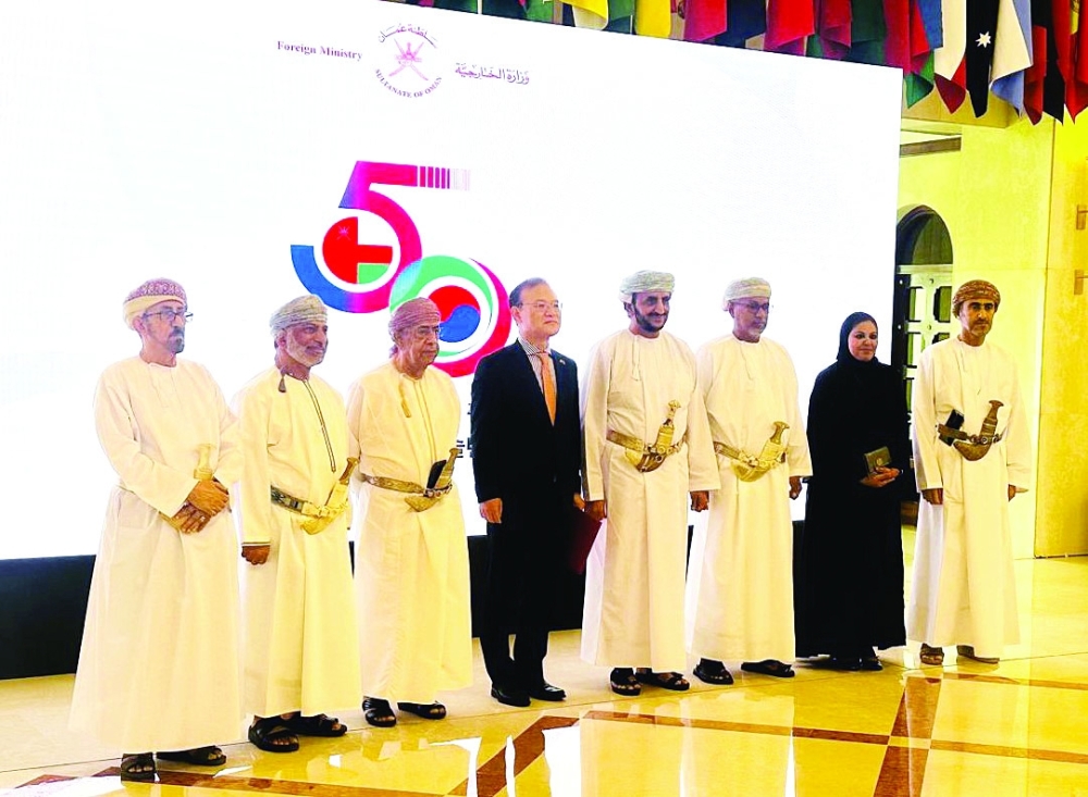 Kiejoo Kim, South Korean Ambassador to the Sultanate of Oman  and guests during the celebration of the 50th anniversary of diplomatic relations between Oman and South Korea.
