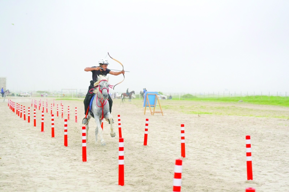 Mohammed al Attar during horseback archery competition