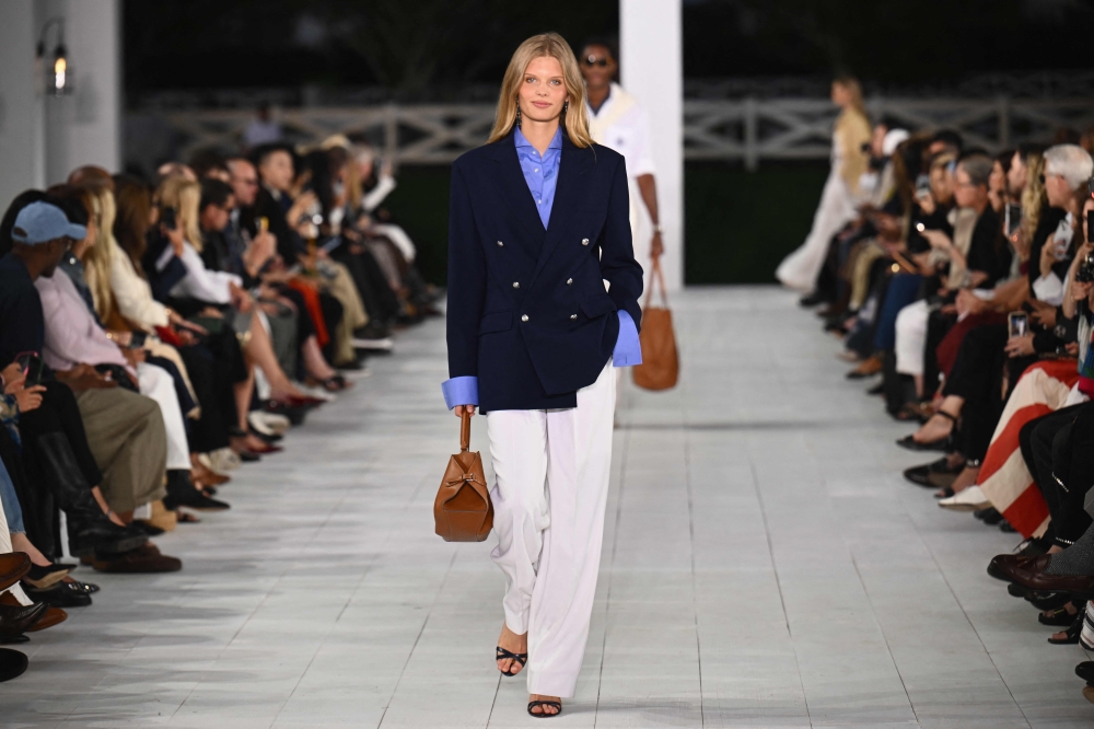 Models walk the runway during the Ralph Lauren Spring/Summer 2025 collection runway show in Bridgehampton, New York on September 5, 2024.   (Photo by ANGELA WEISS / AFP)


