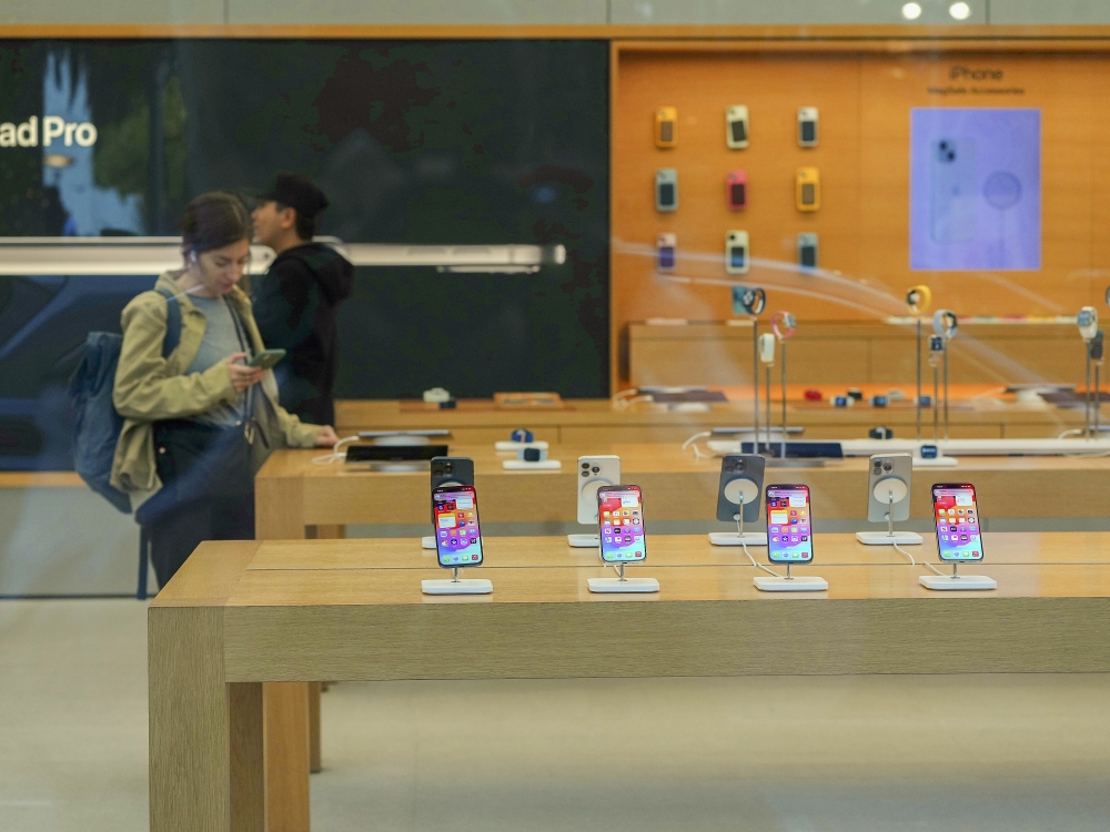 iPhones on display at an Apple store, in San Francisco, on July 15, 2024. (Jim Wilson/The New York Times)