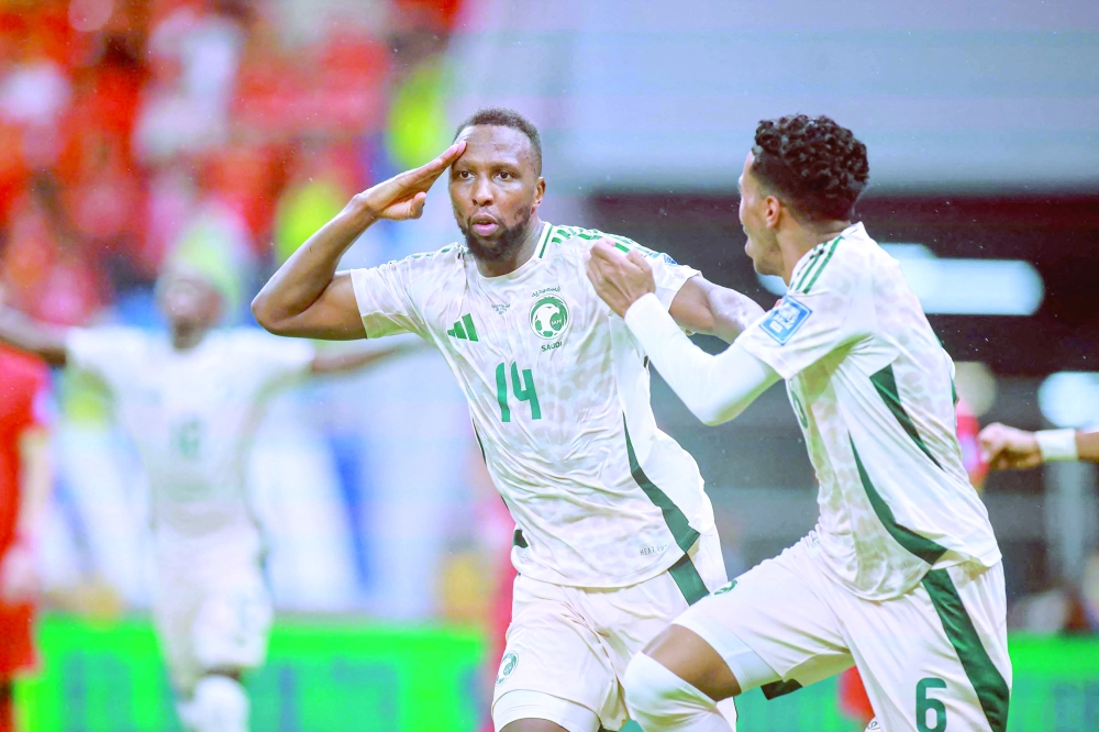 Saudi Arabia's 10 men fight back to beat China