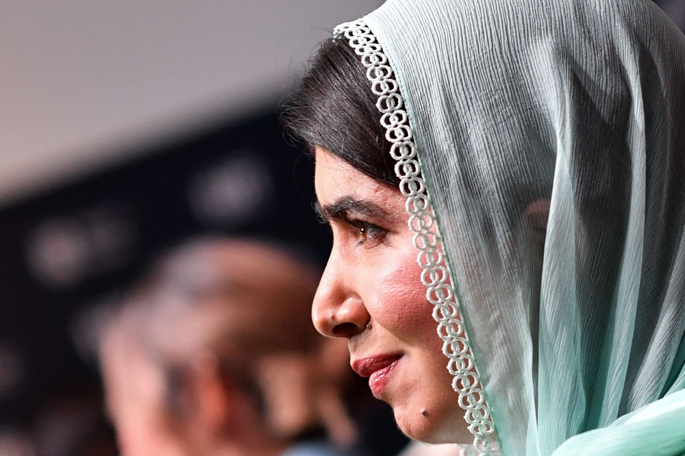 Pakistani activist and producer Malala Yousafzai attends the world premiere of "The Last of the Sea Women" at TIFF Lightbox theatre during the Toronto International Film Festival (TIFF) in Toronto, Ontario, Canada, on September 8, 2024. (Photo by VALERIE MACON / AFP)

