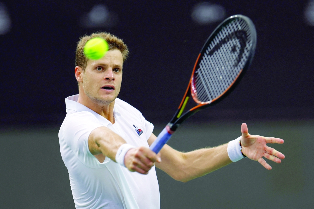 Germany's Yannick Hanfmann in action during his singles match against Slovakia's Jozef Kovalik.