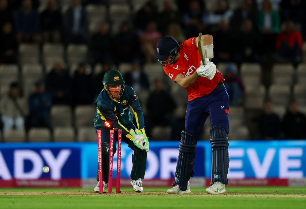 Cricket - First T20 International - England v Australia - The Ageas Bowl, Southampton, Britain - September 11, 2024 Australia's Adam Zampa takes the wicket of England's Jaimie Overton Action Images via Reuters/Matthew Childs
