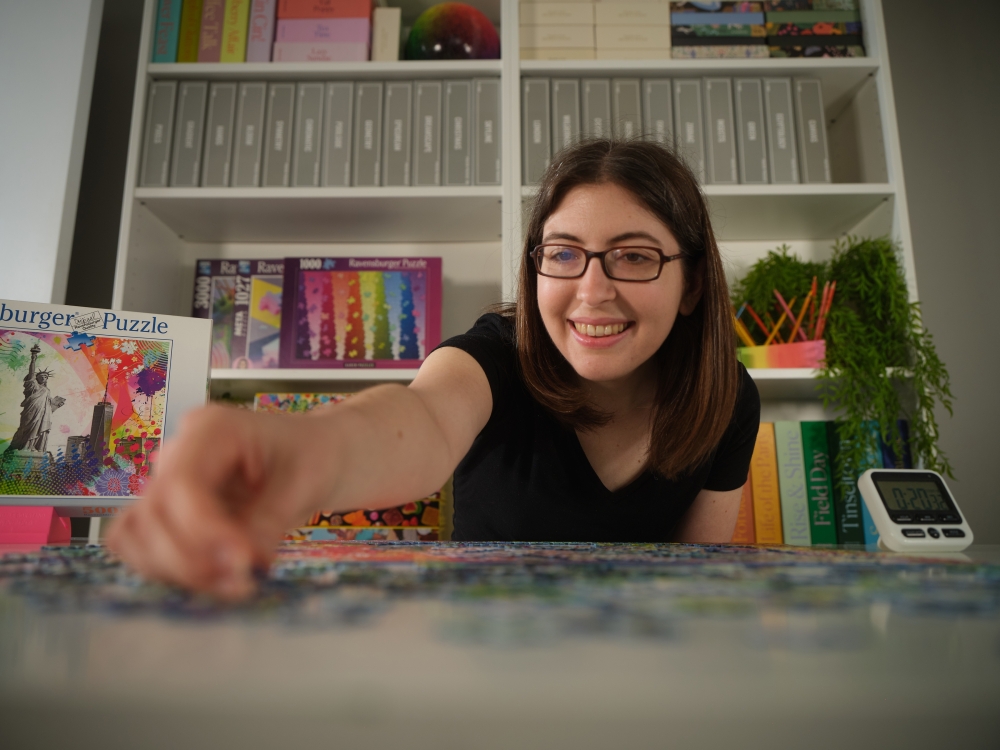 Karen Kavett, 33, works on a puzzle in Los Angeles 