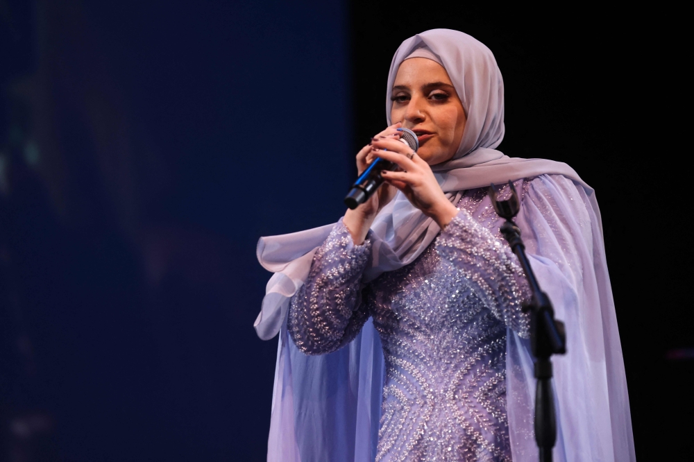 Syrian singer Ghaliaa Chaker performs during her concert in Beirut
