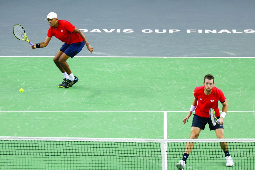 United States overcome Germany to stay perfect in Davis Cup