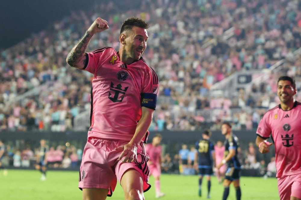 Inter Miami's Argentine forward #10 Lionel Messi celebrates his first goal during the Major League Soccer  --AFP