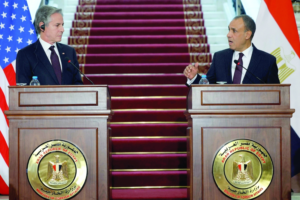 Egypt's Foreign Minister Badr Abdelatty and US Secretary of State Antony Blinken give a joint press conference after their meeting at Tahrir palace in Cairo. - AFP