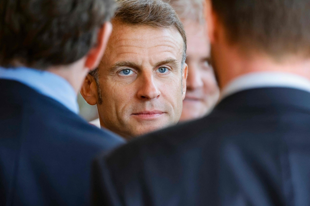 (Government Settled) France's President Emmanuel Macron looks on as he visits the "Nanterre Arboretum", near Pari