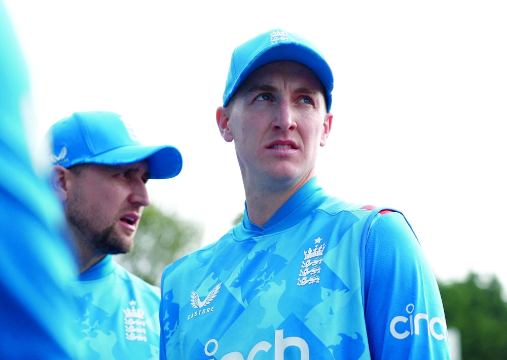 England's Harry Brook with teammates -- Reuters