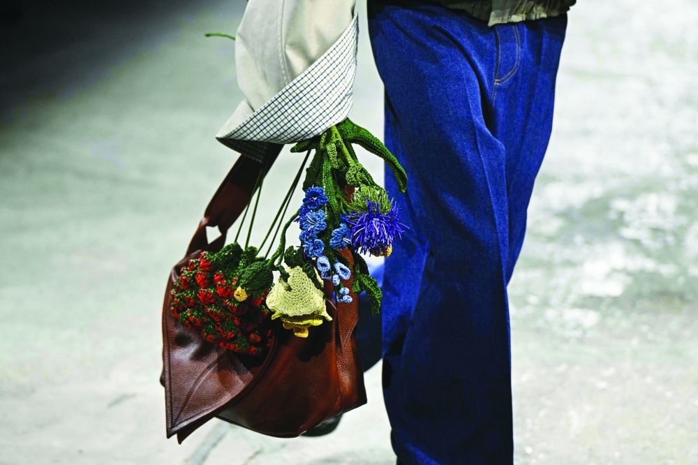 A model walks the runway during the Bottega Veneta collection show at Milan's Fashion Week Womenswear Spring / Summer 2025, on September 21, 2024 in Milan.