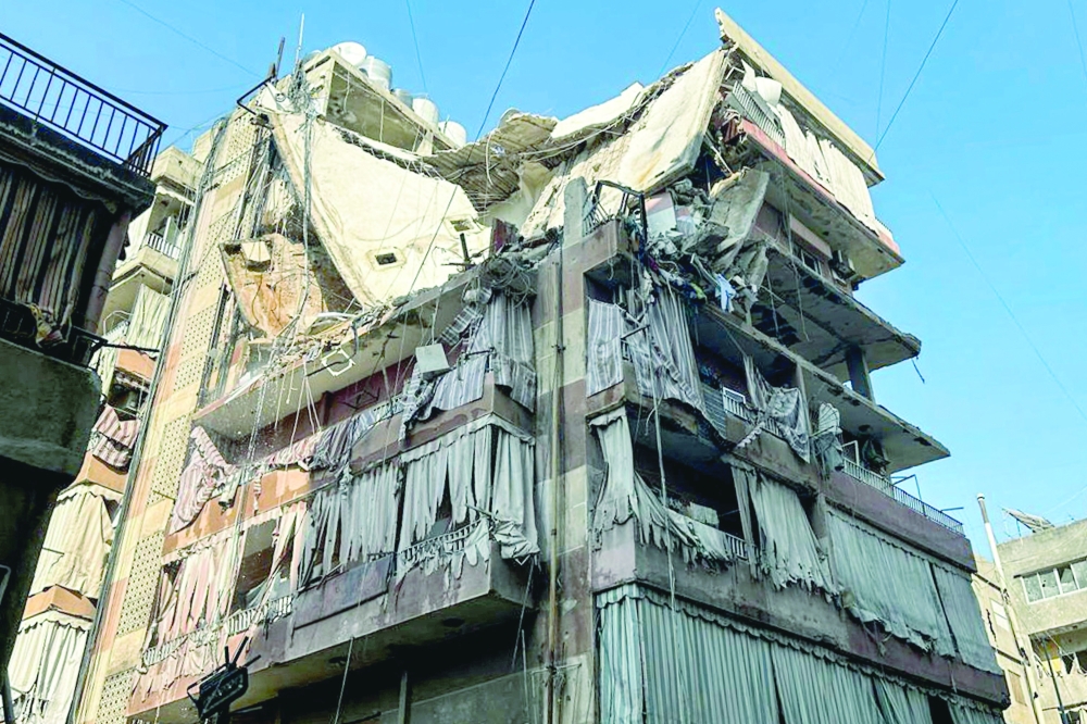 A residential building hit by an Israeli strike in the Ghobeiri area of Beirut's southern suburbs. — AFP