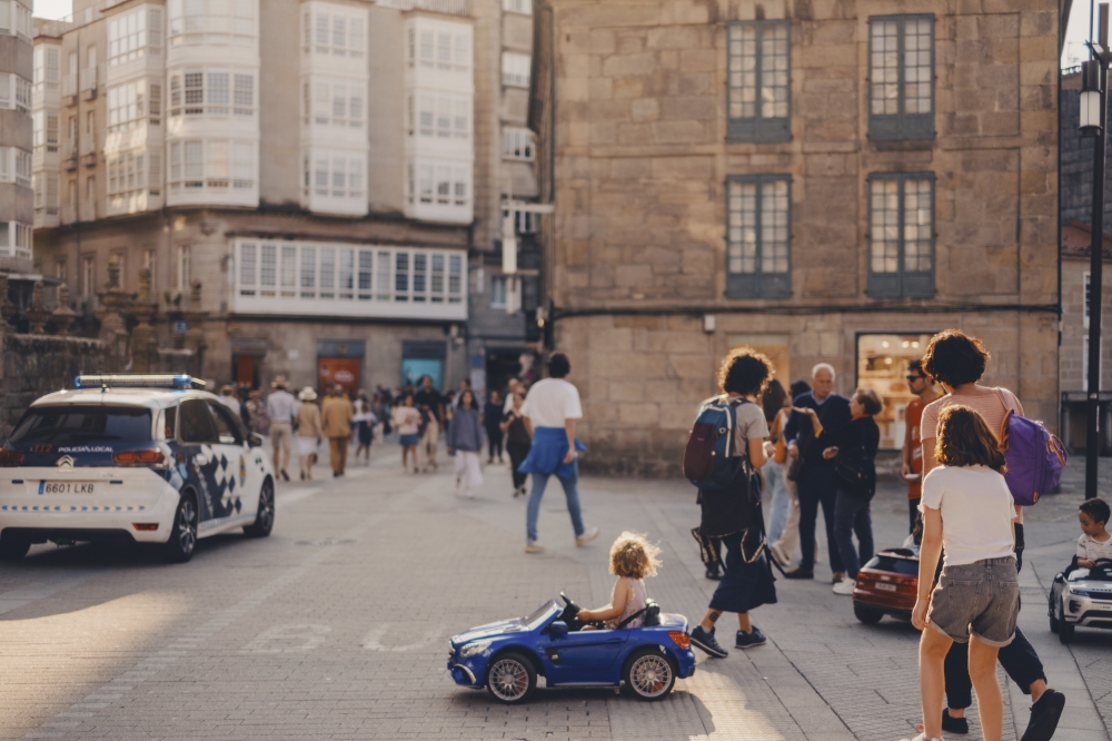 Pedestrians in the downtown area of Pontevedra, a city in northwest Spain, Sept. 9, 2024.  (Matilde Viegas/The New York Times)