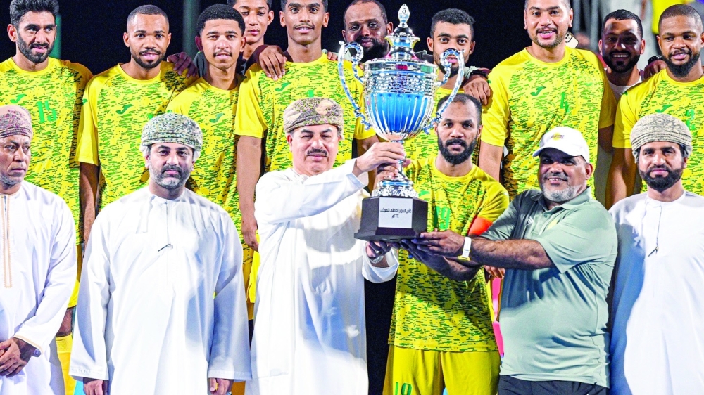 Seeb players celebrate with the Super Cup.