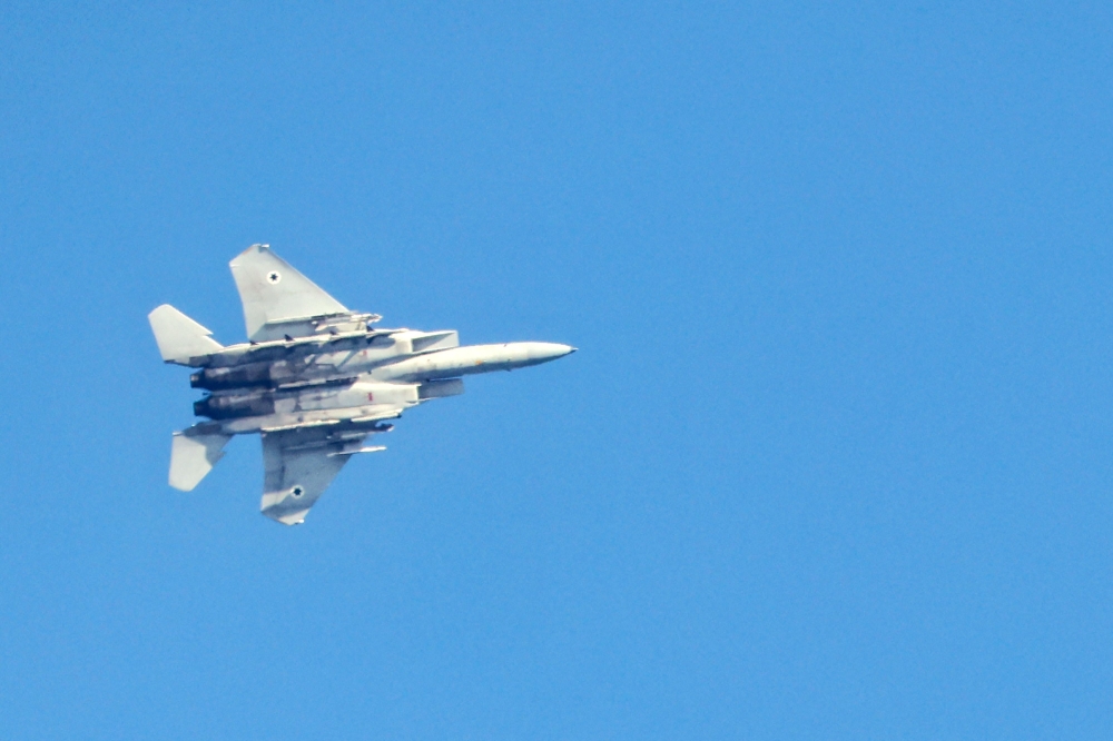 An Israeli F-15 Eagle fighter jets flies over the northern city of Haifa on September 26, 2024.