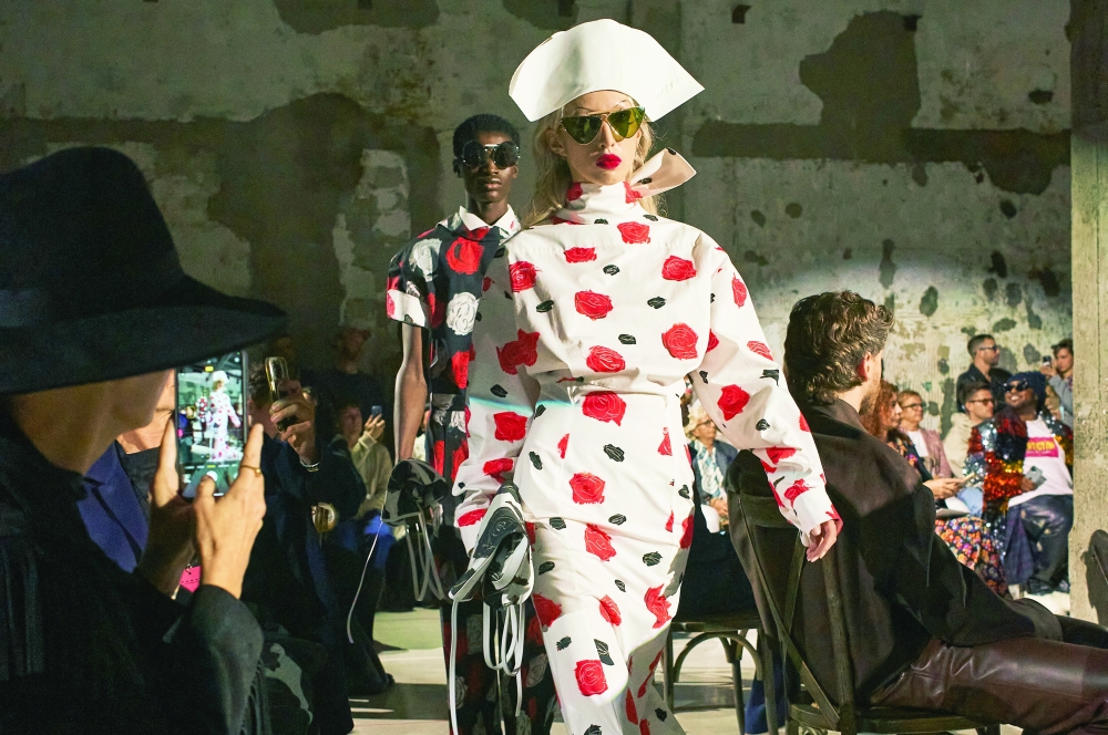 Models present looks at the Marni spring 2025 fashion show in Milan, Sept. 17, 2024. 