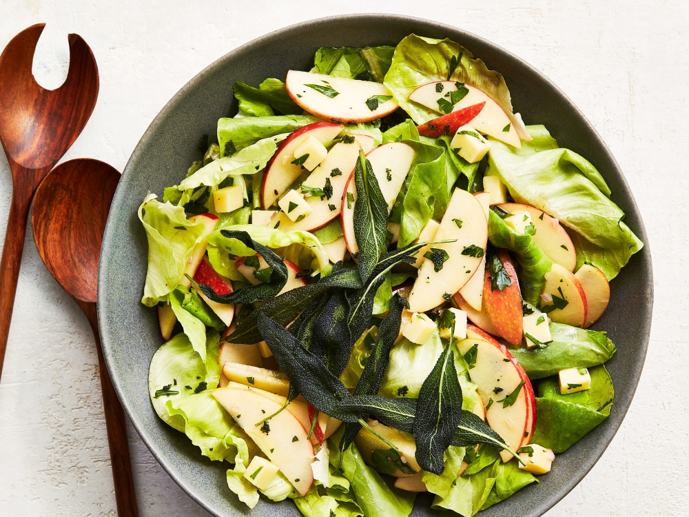 Fall salad with apples, cheddar and crispy sage. Props styled by Carla Gonzalez-Hart. Food styled by Monica Pierini. (Armando Rafael/The New York Times)