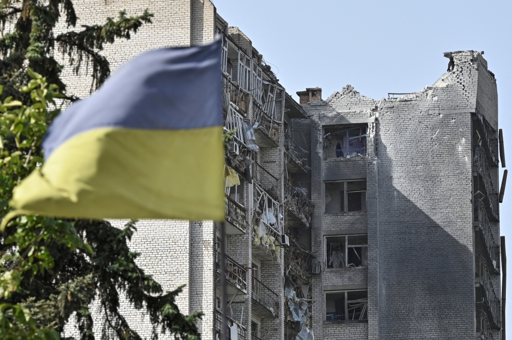 A view shows an apartment building damaged by a Russian air strike, in Zaporizhzhia, Ukraine. — Reuters 