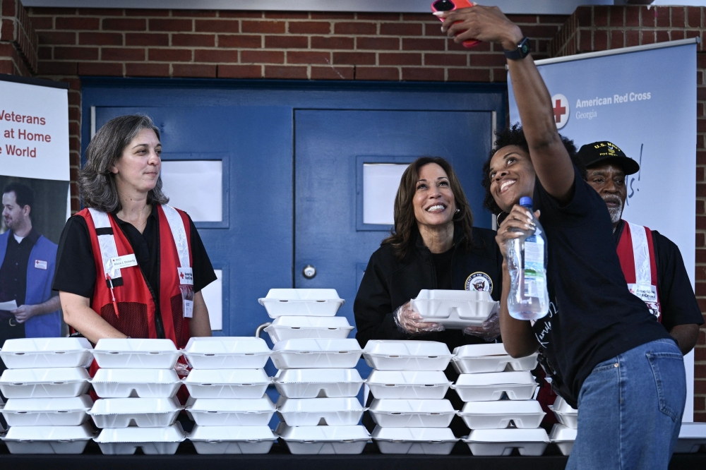 US Vice President Kamala Harris with a woman