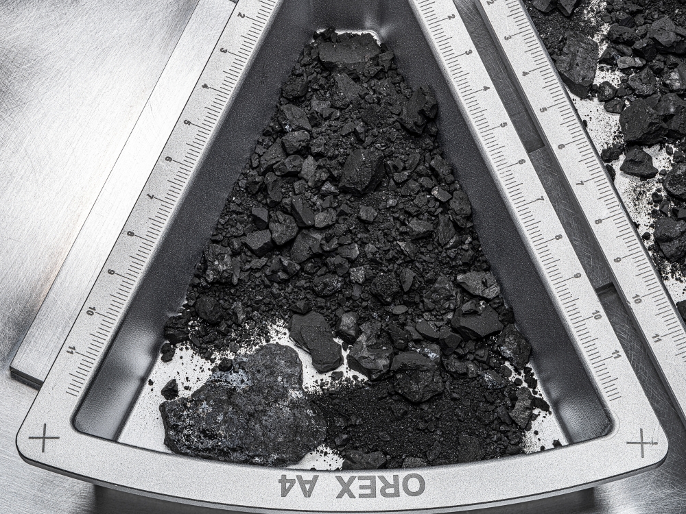 A tray containing a sample from the asteroid Bennu. (Erika Blumenfeld & Joseph Aebers/JSC/NASA via The New York Times)